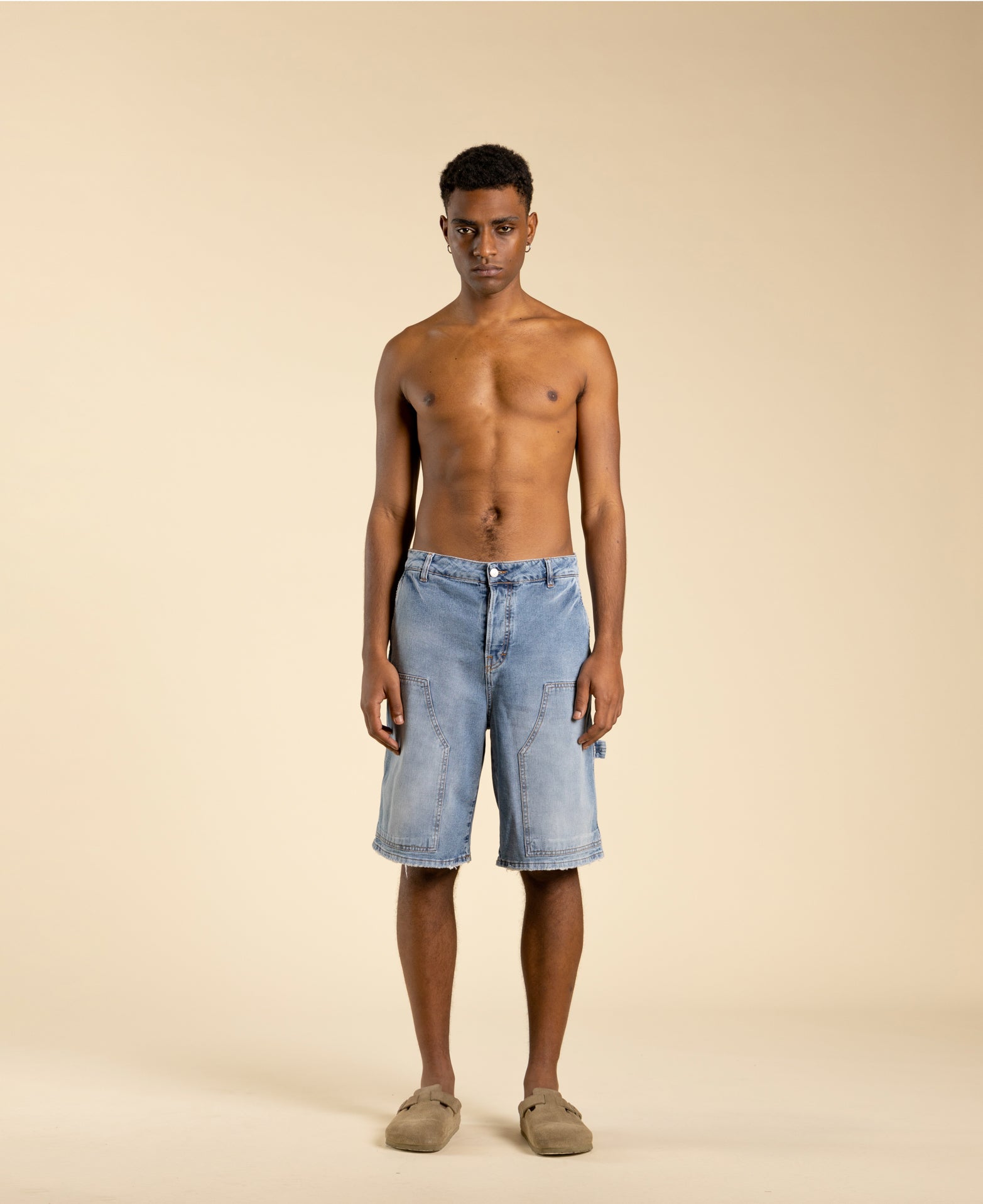 Wide carpenter Bermuda shorts with a faded effect