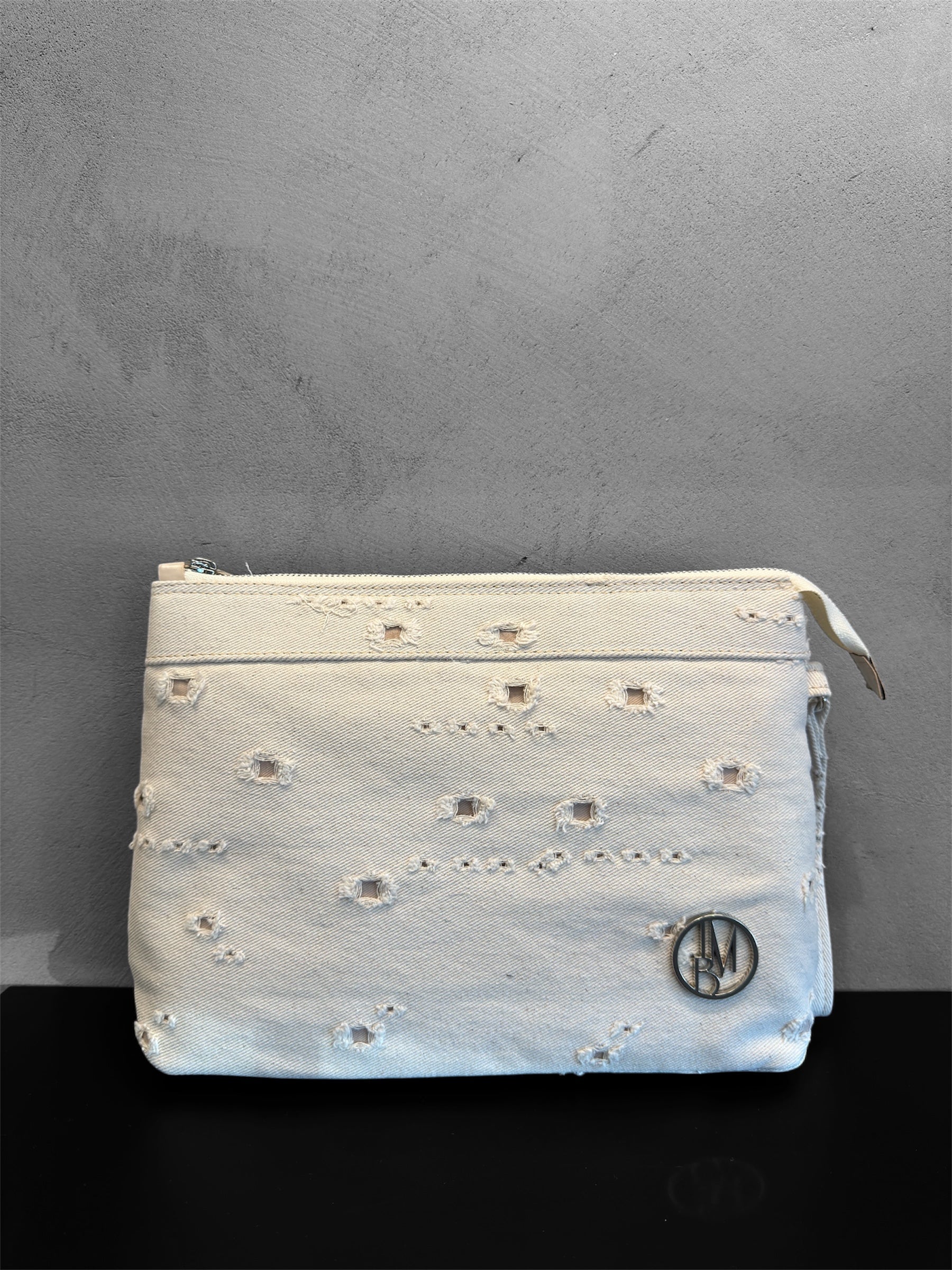 Cream denim clutch bag