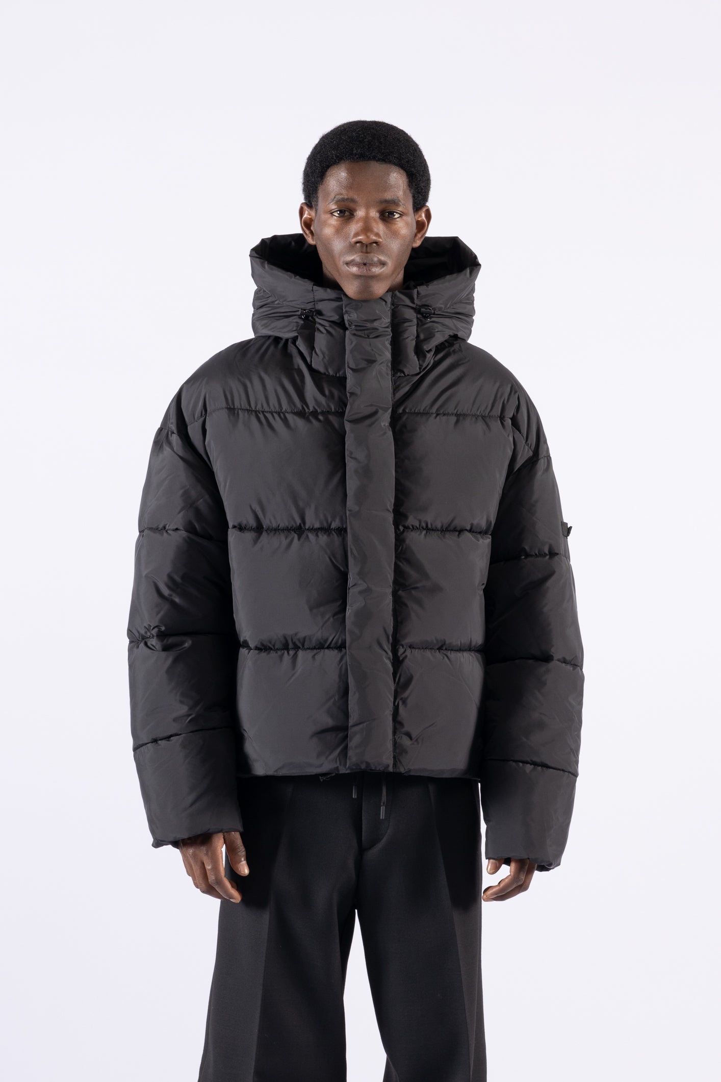 Piumino oversize con cappuccio - Nero