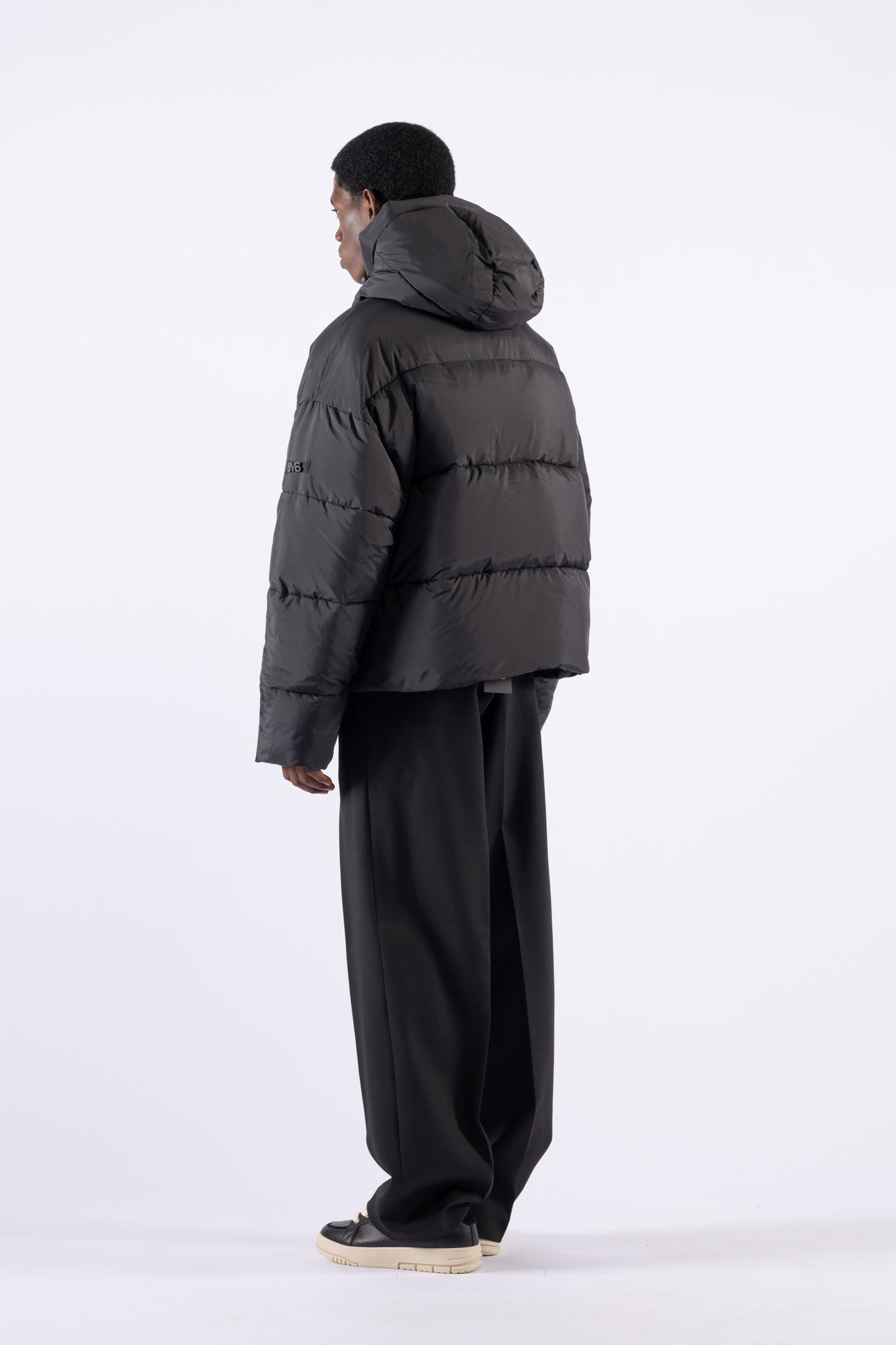 Piumino oversize con cappuccio - Nero