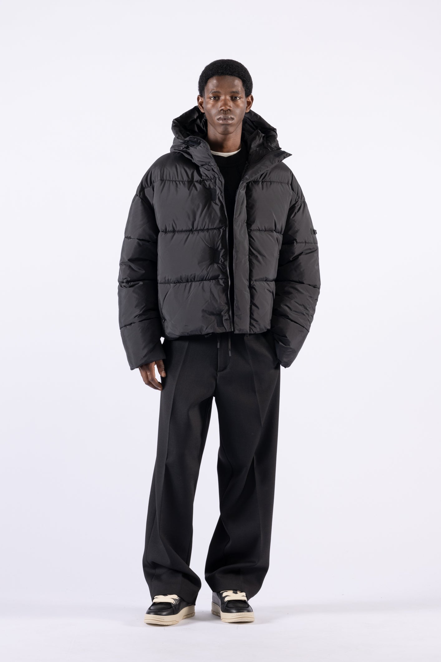 Piumino oversize con cappuccio - Nero