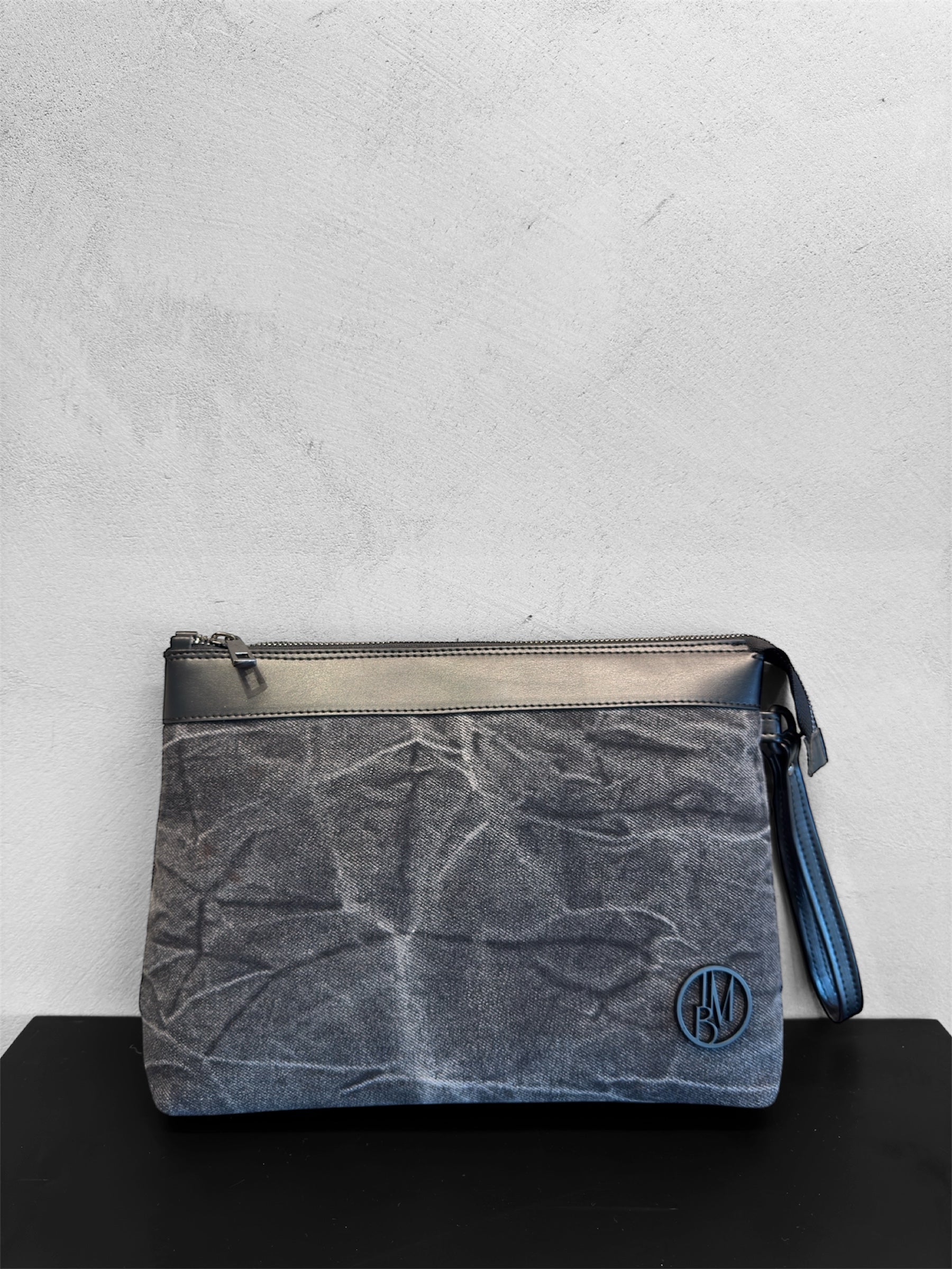 Black denim clutch bag
