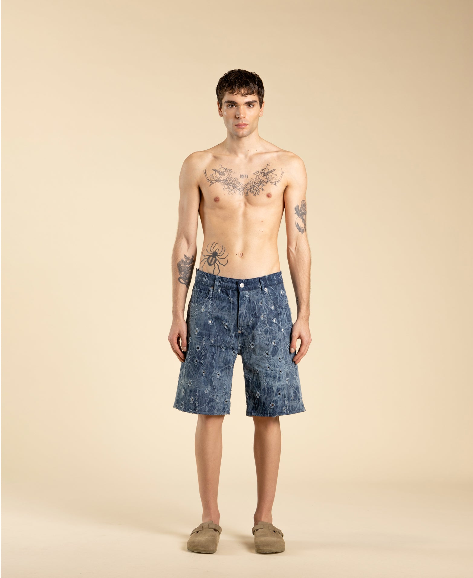 Ripped denim Bermuda shorts