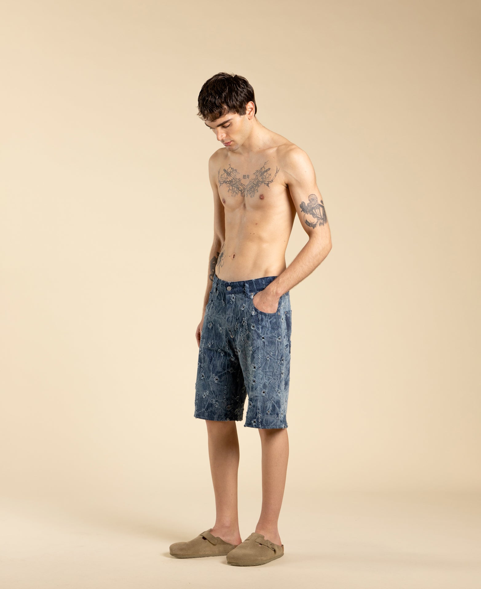 Ripped denim Bermuda shorts