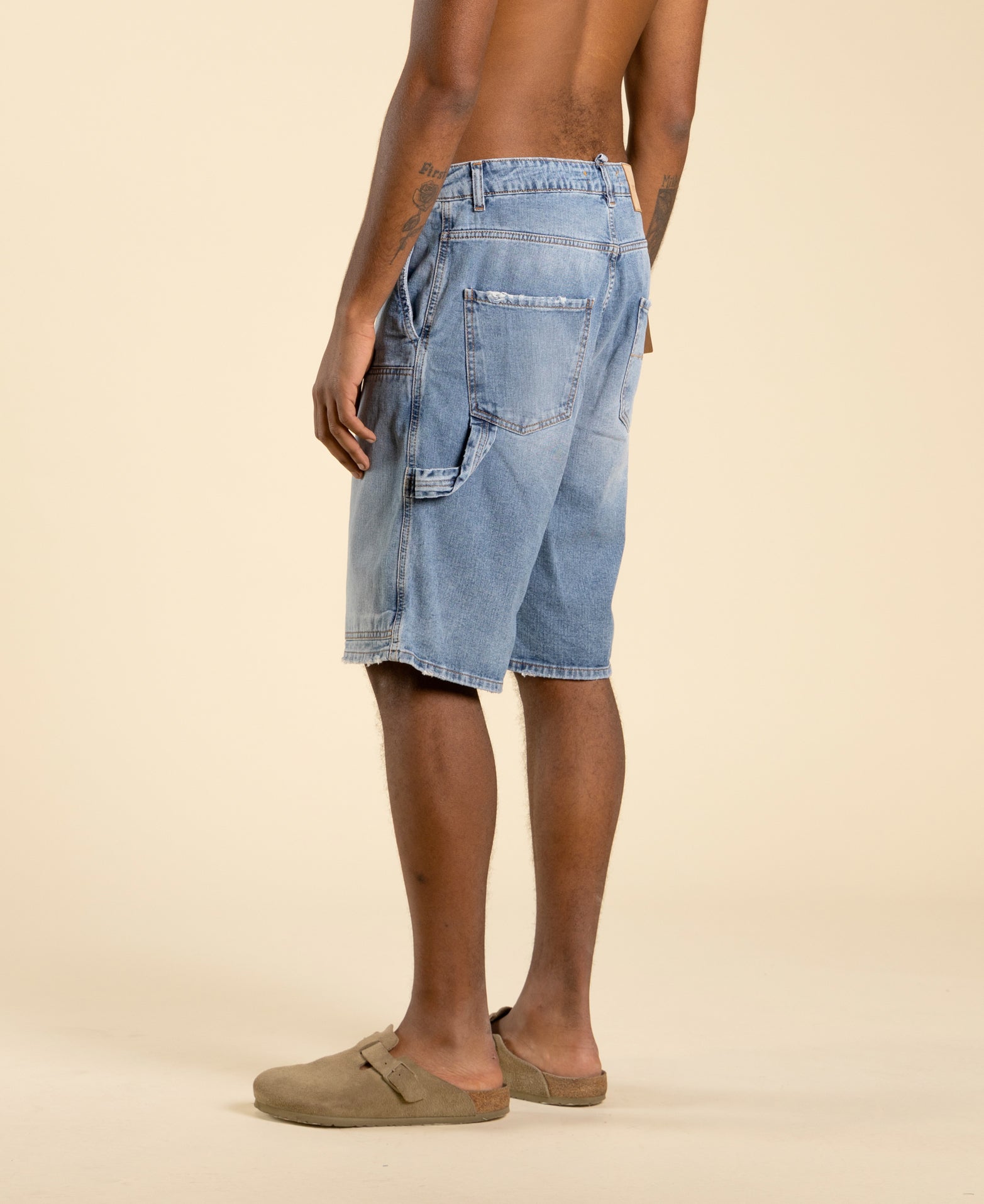 Wide carpenter Bermuda shorts with a faded effect