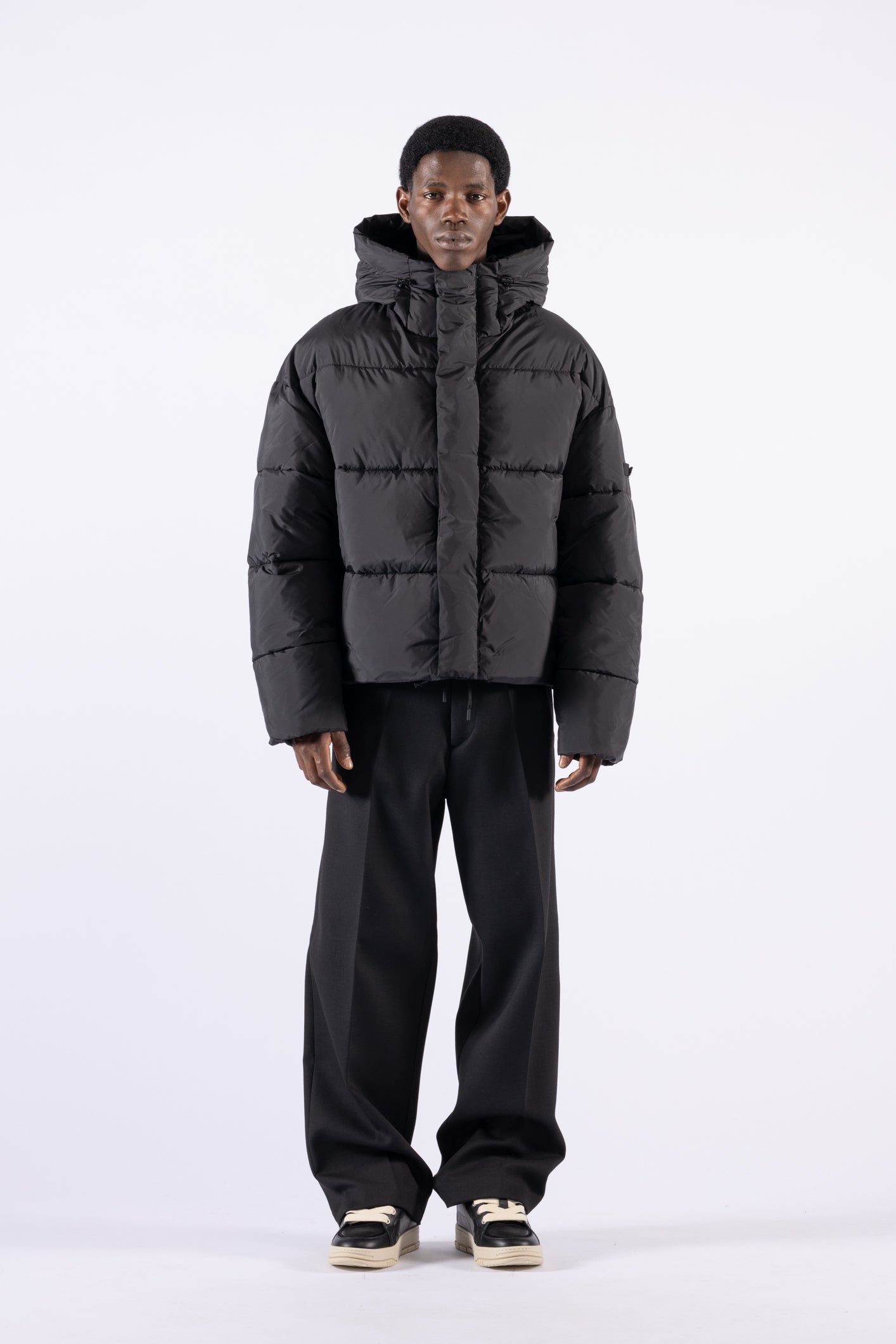 Piumino oversize con cappuccio - Nero