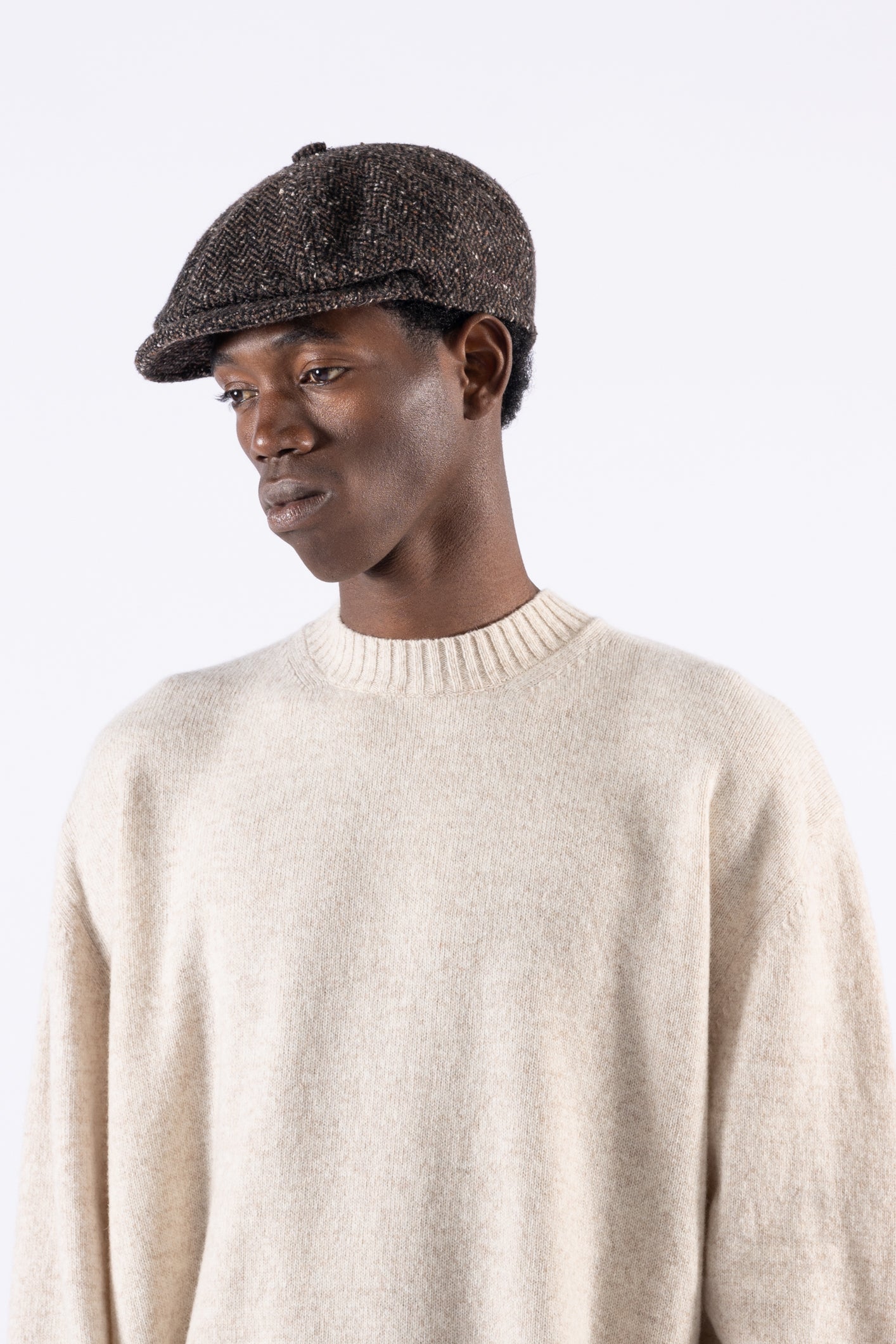 Coppola in lana motivo spigato