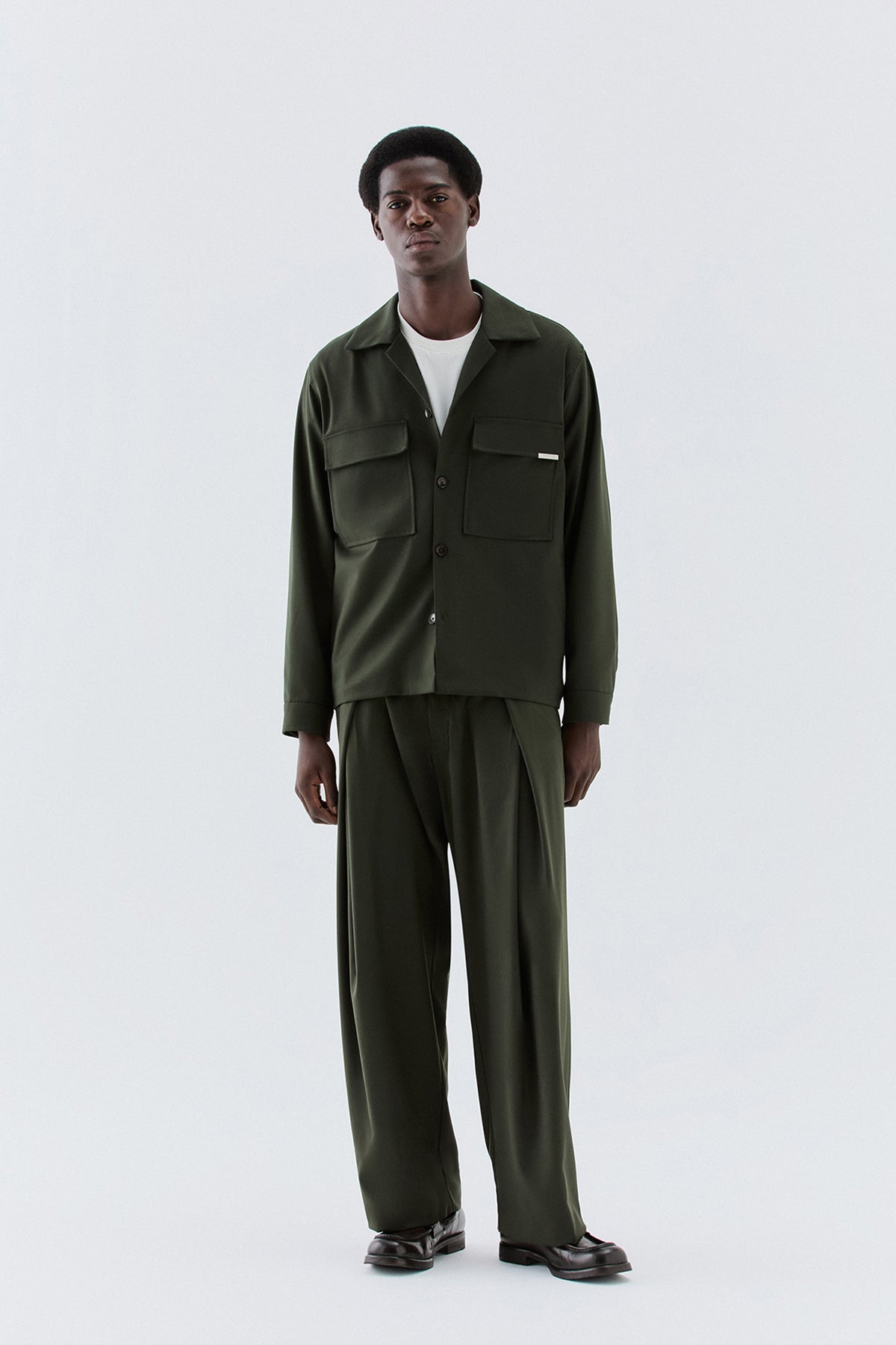 Pantaloni larghi con pinces avanti - Verde