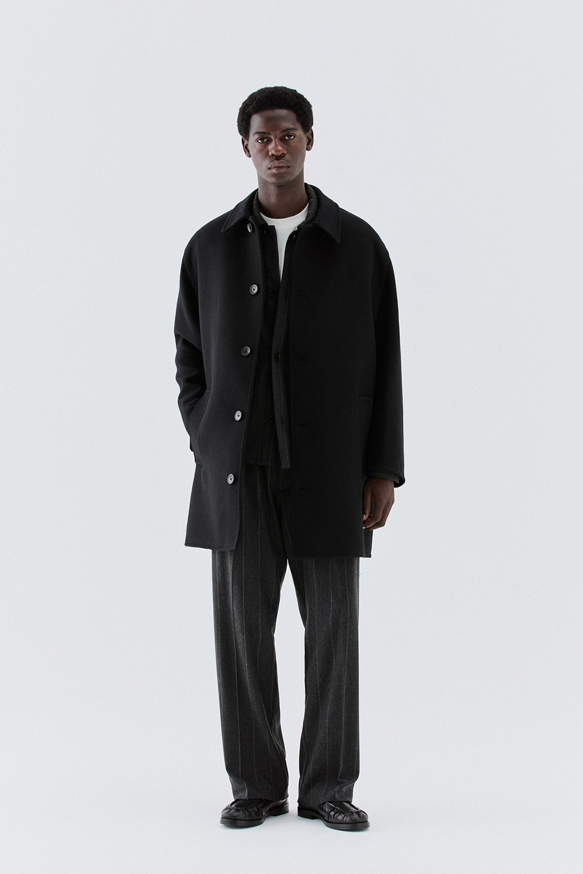 Pantaloni larghi gessati in lana