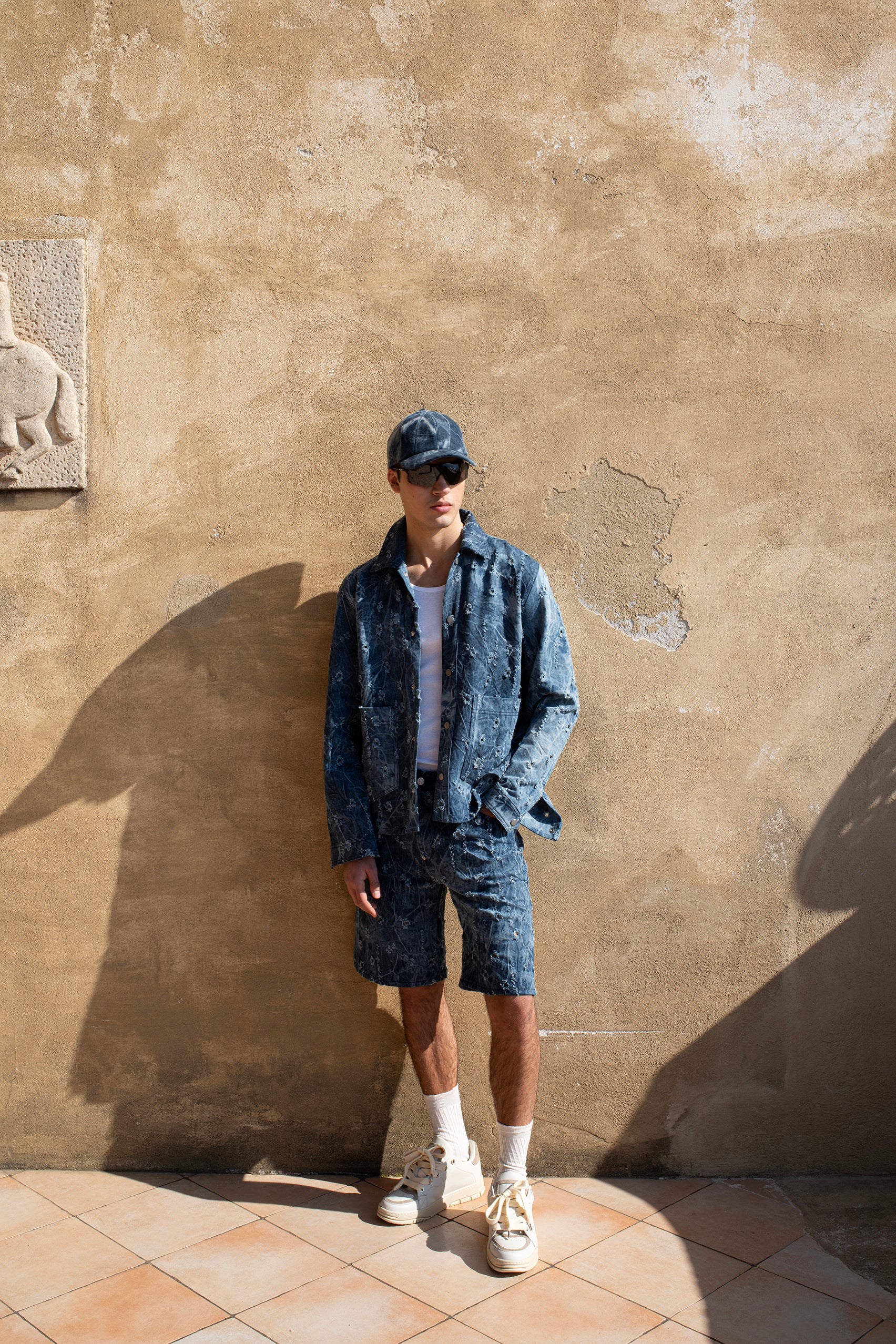 Ripped denim Bermuda shorts