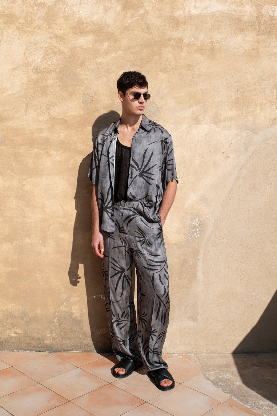 Pantalone con elastico in vita stampa palme