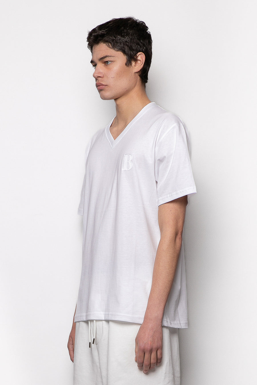 T-shirt in tessuto cotone scollo a punta con ricamo - Bianco